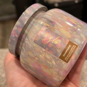 Capri Blue All A Glow glass candle in scent “Champagne”